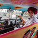 “Thank you, thank you! Our taxi became very blingy, very glamorous!” — Satmant Singh, taxi driver